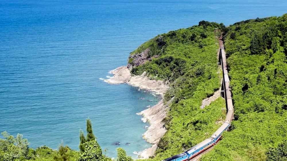 For photography lovers, the contrast between the steel railway, lush landscape, and glistening sea creates perfect compositions